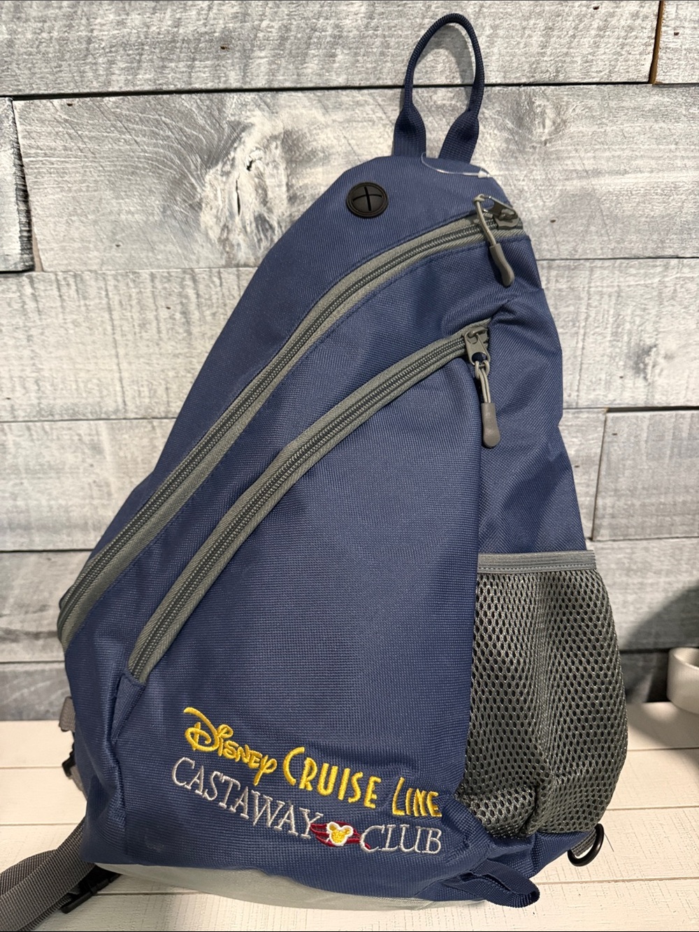Disney Navy and Gray Castaway Club Sling Bag